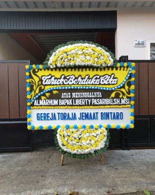 Papan Bunga Duka di Urug